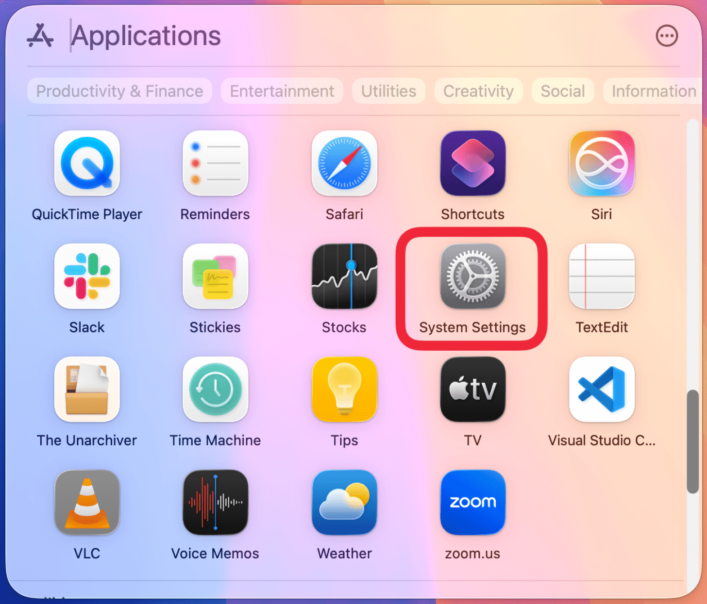 mac app drawer with a red box around system settings