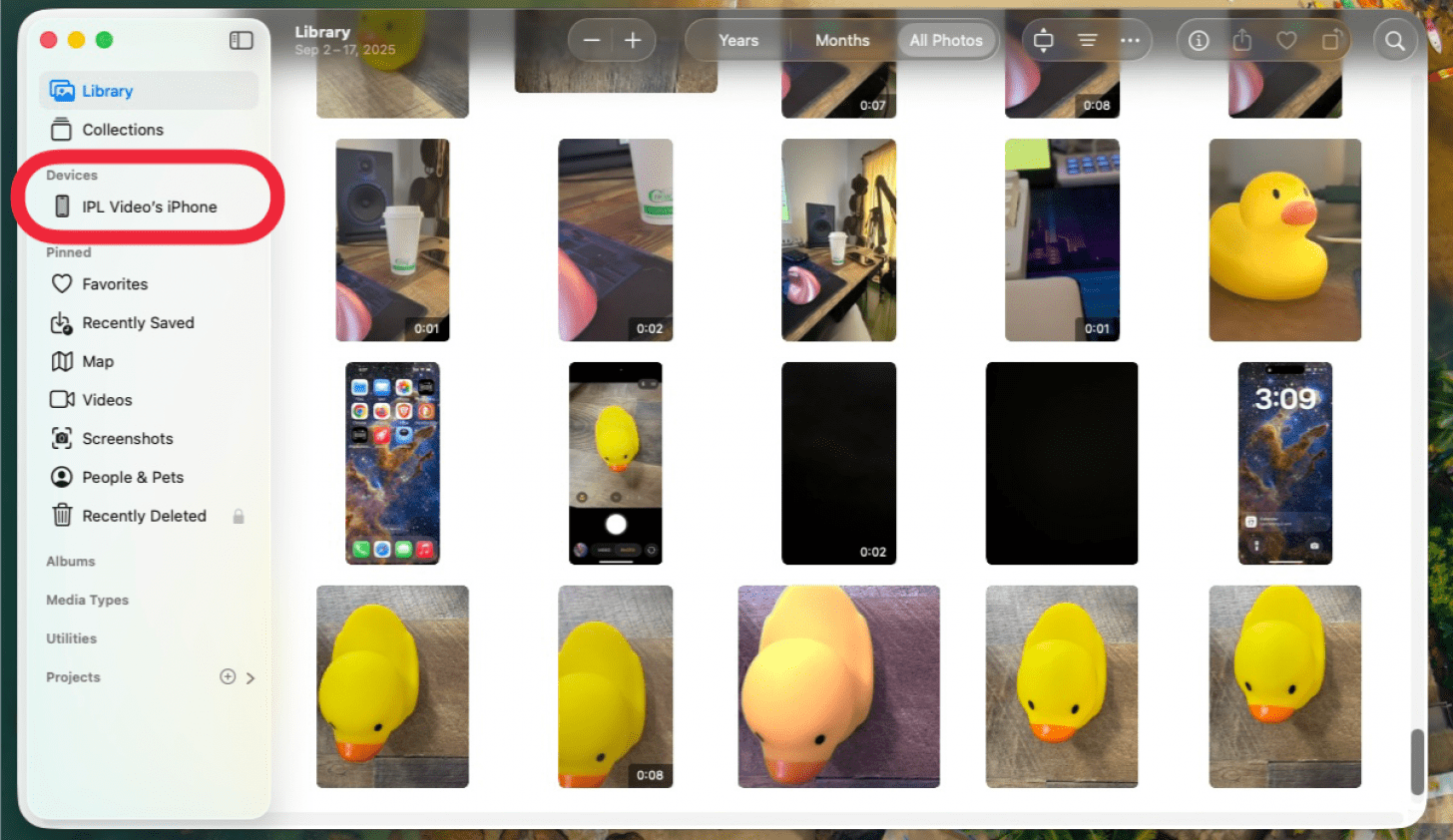 a screenshot of the photos app on mac with a red box around the user's iphone
