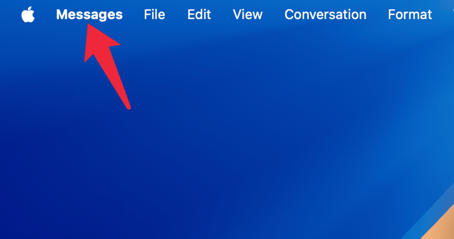 a screenshot of the mac home screen with a red arrow pointing at messages in the taskbar at the top left of the screen