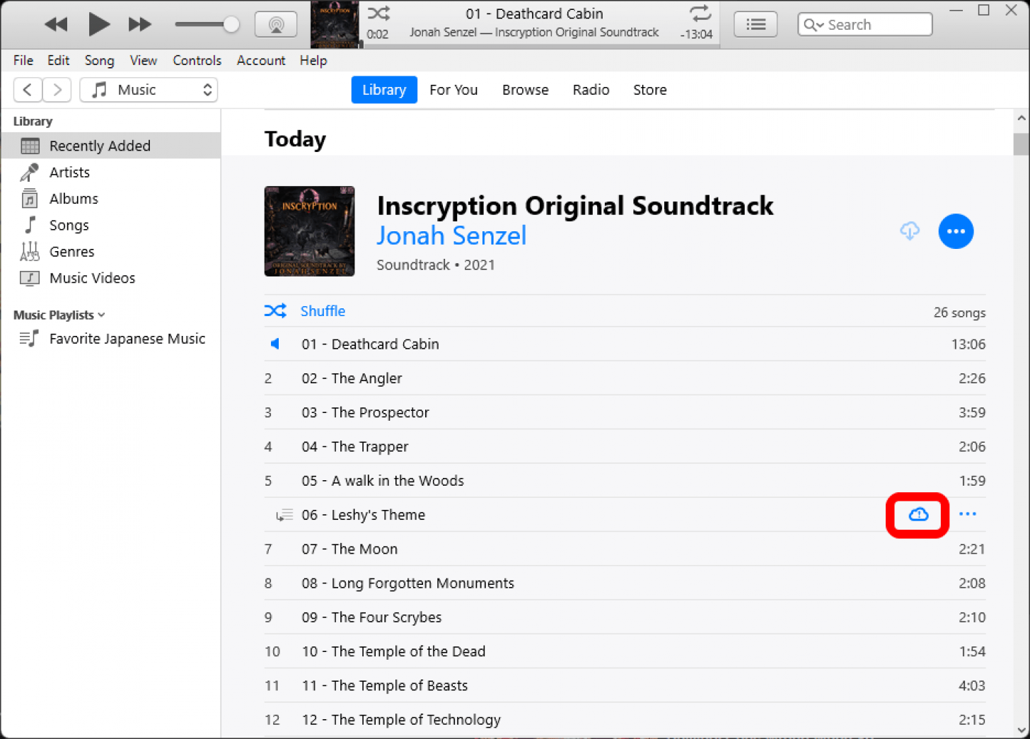 iTunes with an album open and a cloud error icon next to a track marked.