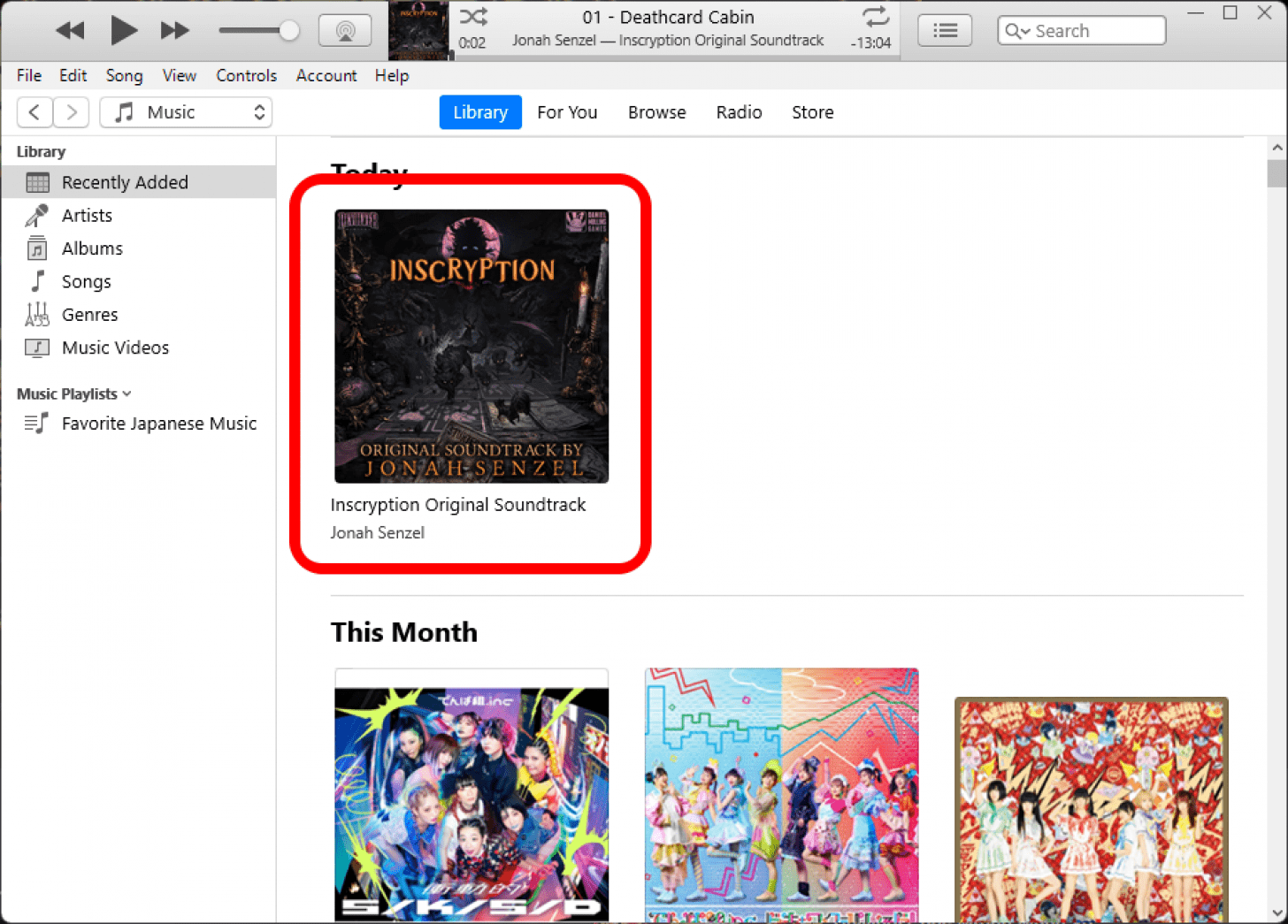 iTunes Library tab with Recently Added selected and the most recent album marked.