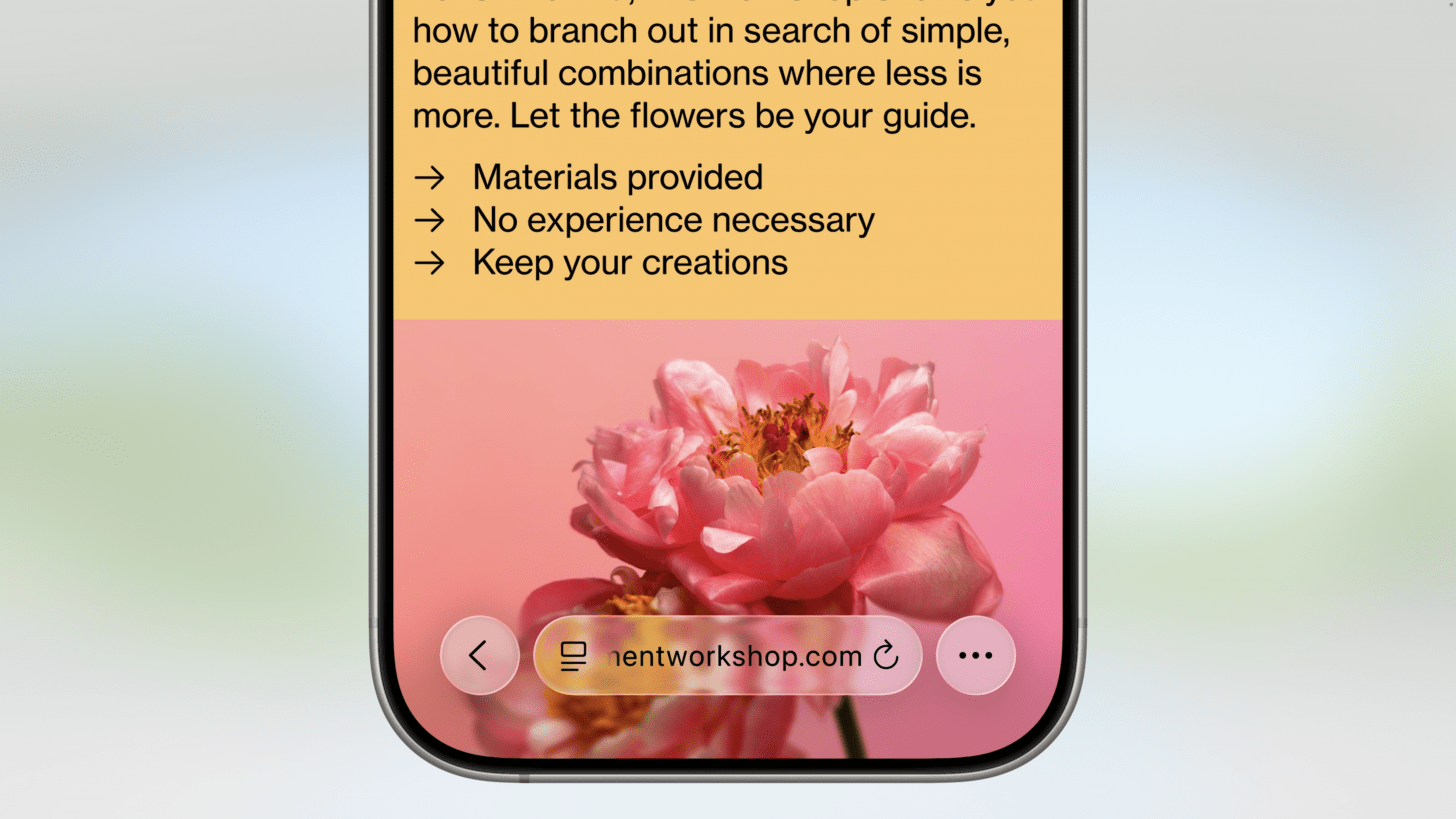 screenshot of an iphone browser on iOS 26 showing translucent UI elements