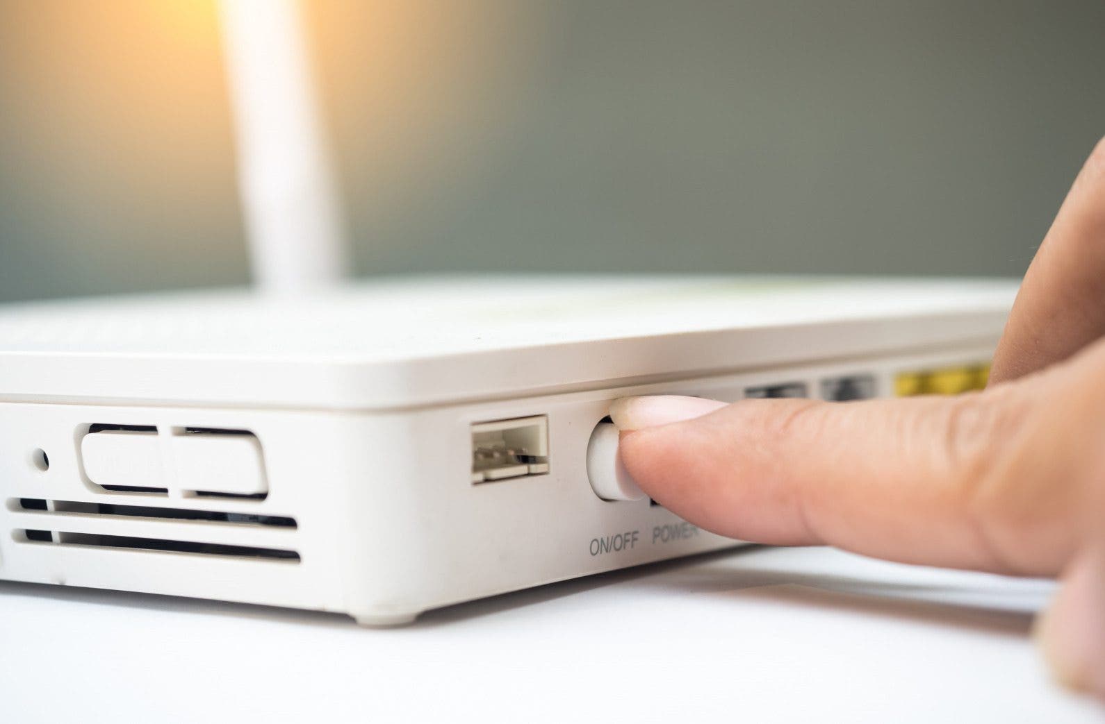 Wireless router modem power button