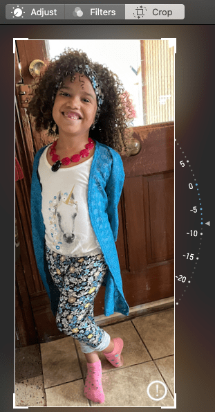 drag the corners of the photo or video to crop