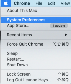 click apple menu then system preferences to connect apple magic mouse
