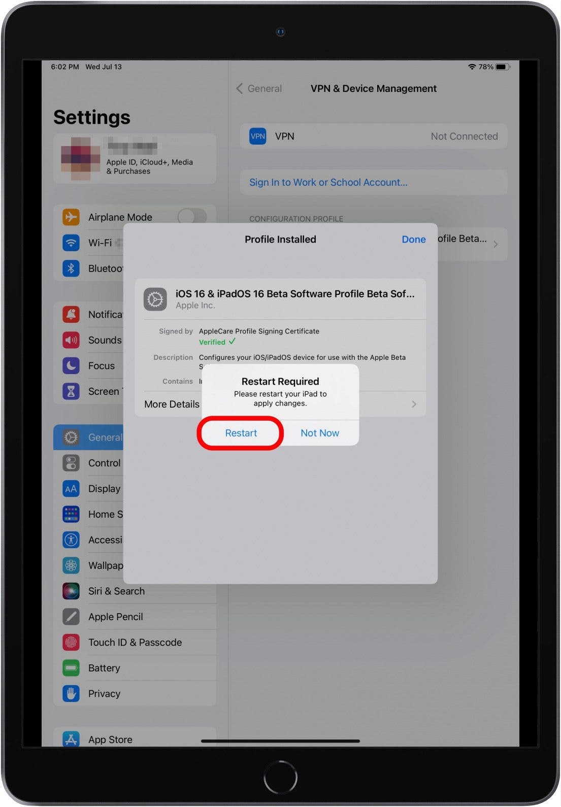 Settings app with Profile Installed window open and Restart required window open on top of that and Restart button marked.