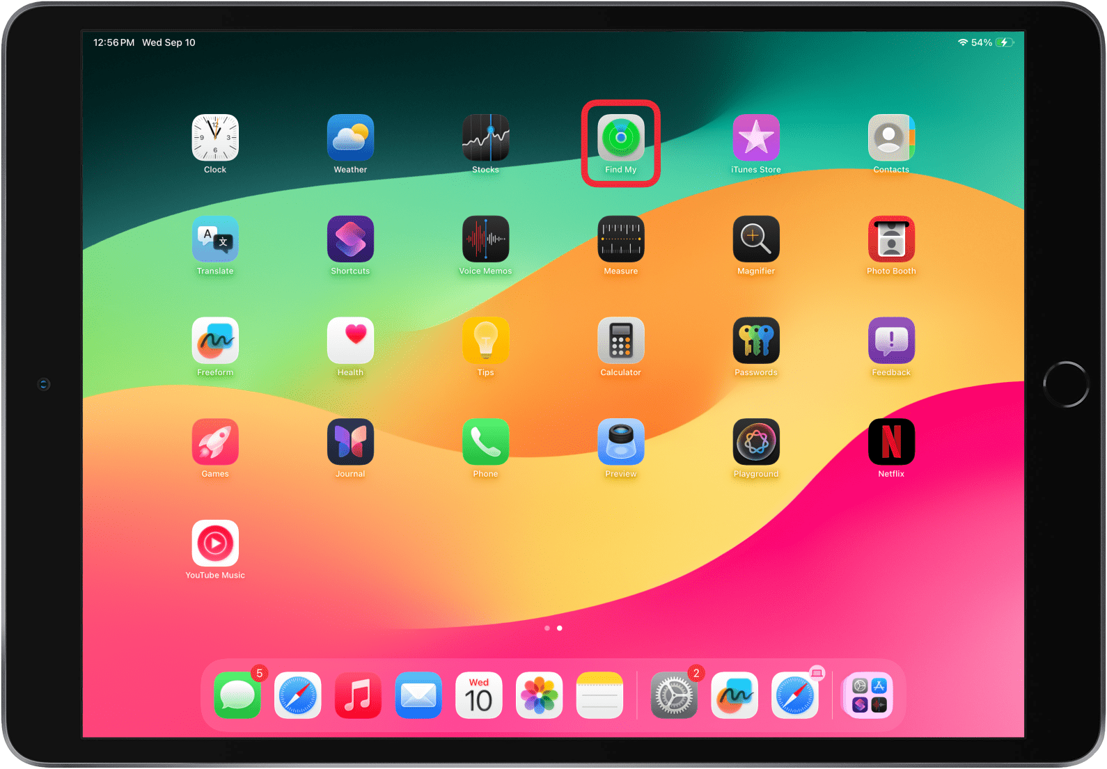 a screenshot of an ipad home screen with a red box around the find my app