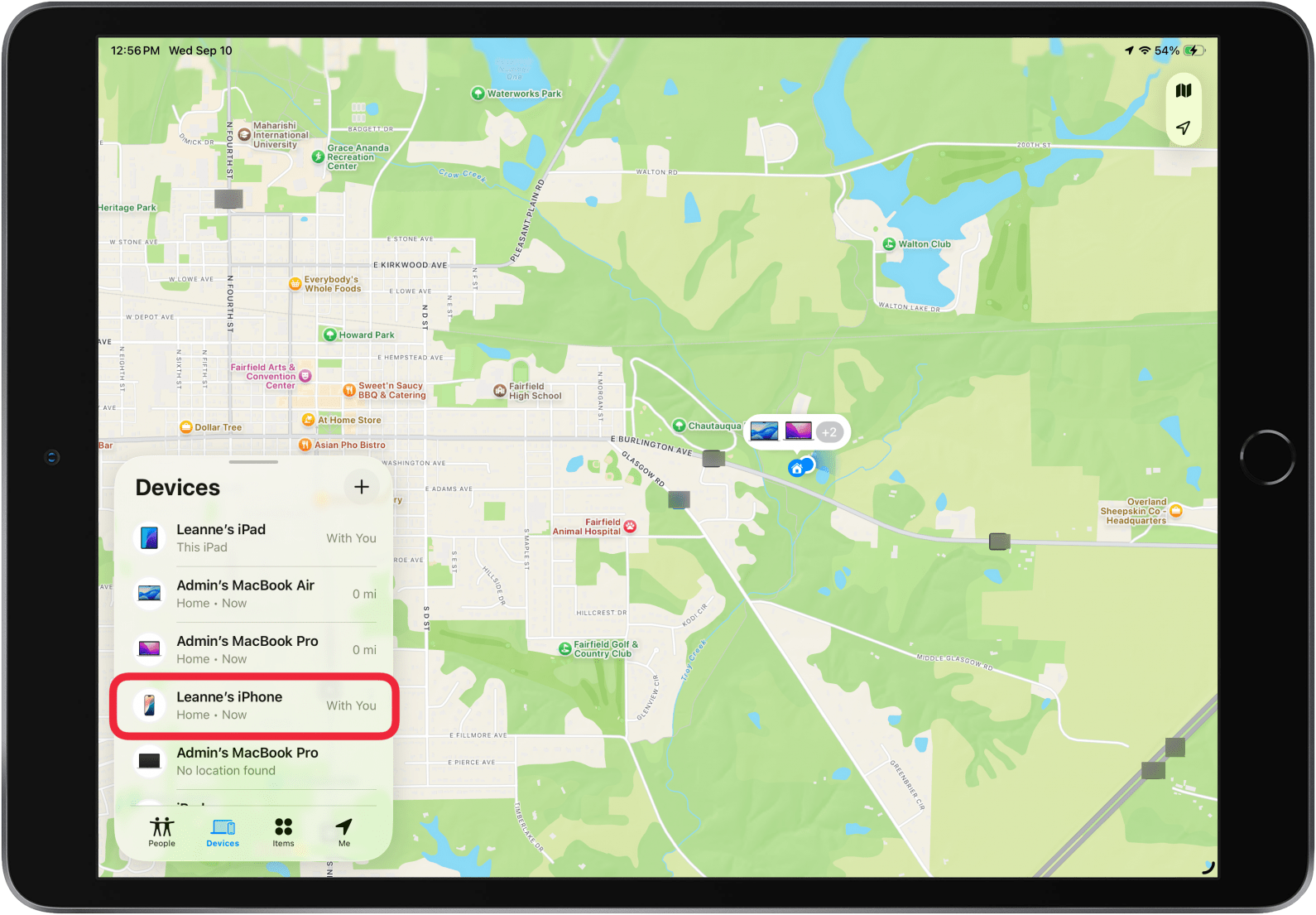 a screenshot of the find my app on ipad displaying device list with a red box around iphone