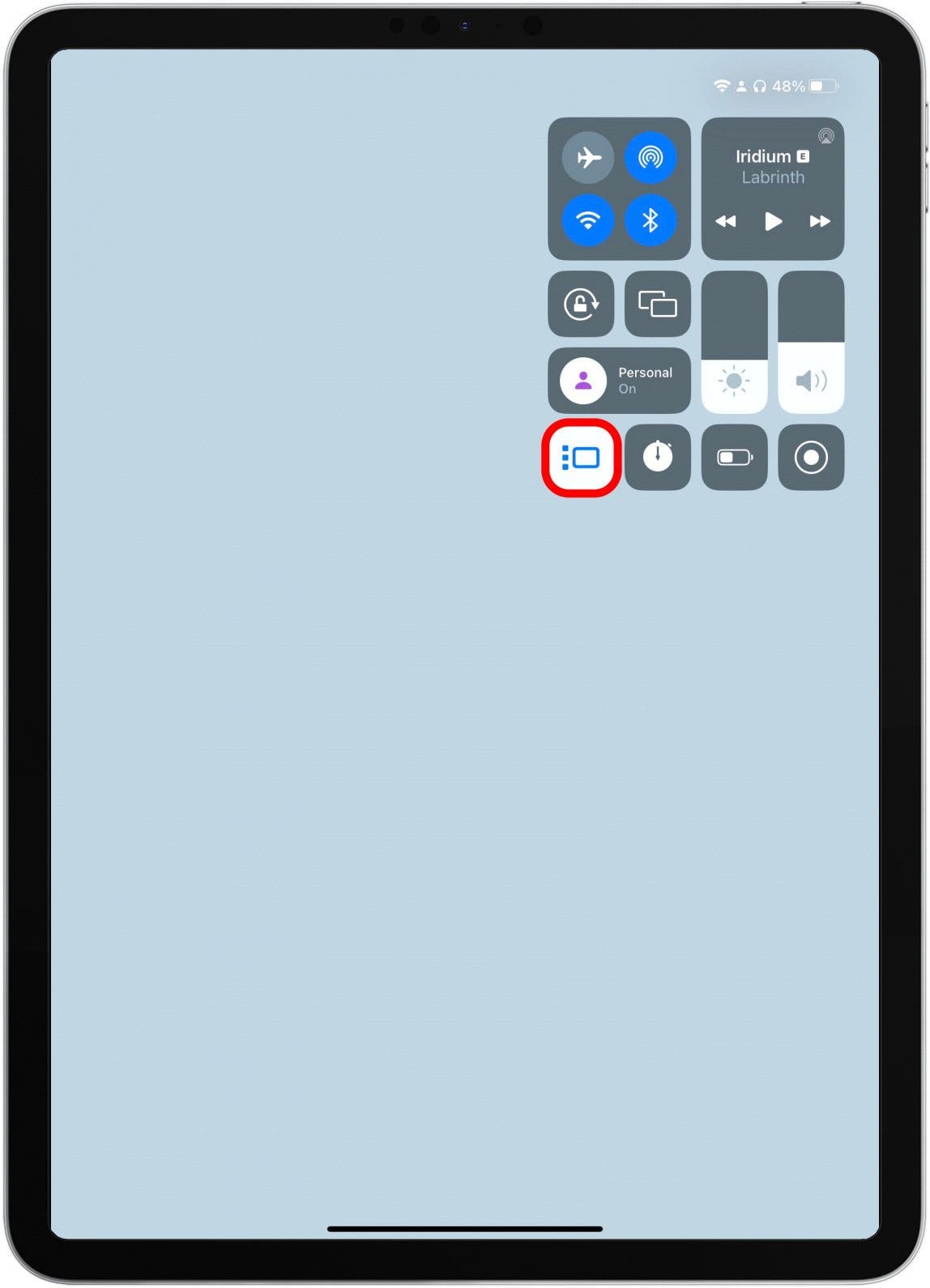 Press and hold the Stage Manager button.