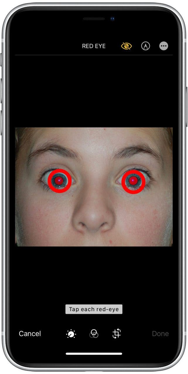 Tap each red eye in the image where you want to apply red eye correction. 