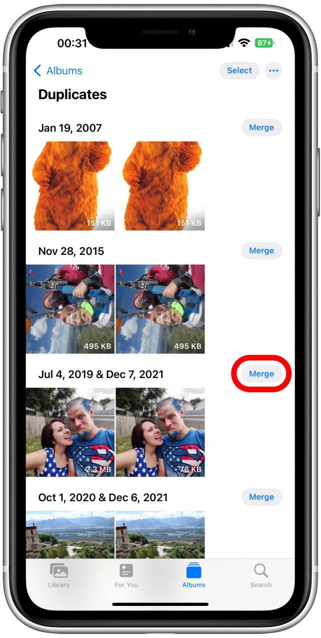 You can also go through individually and tap Merge to manually delete the duplicate.