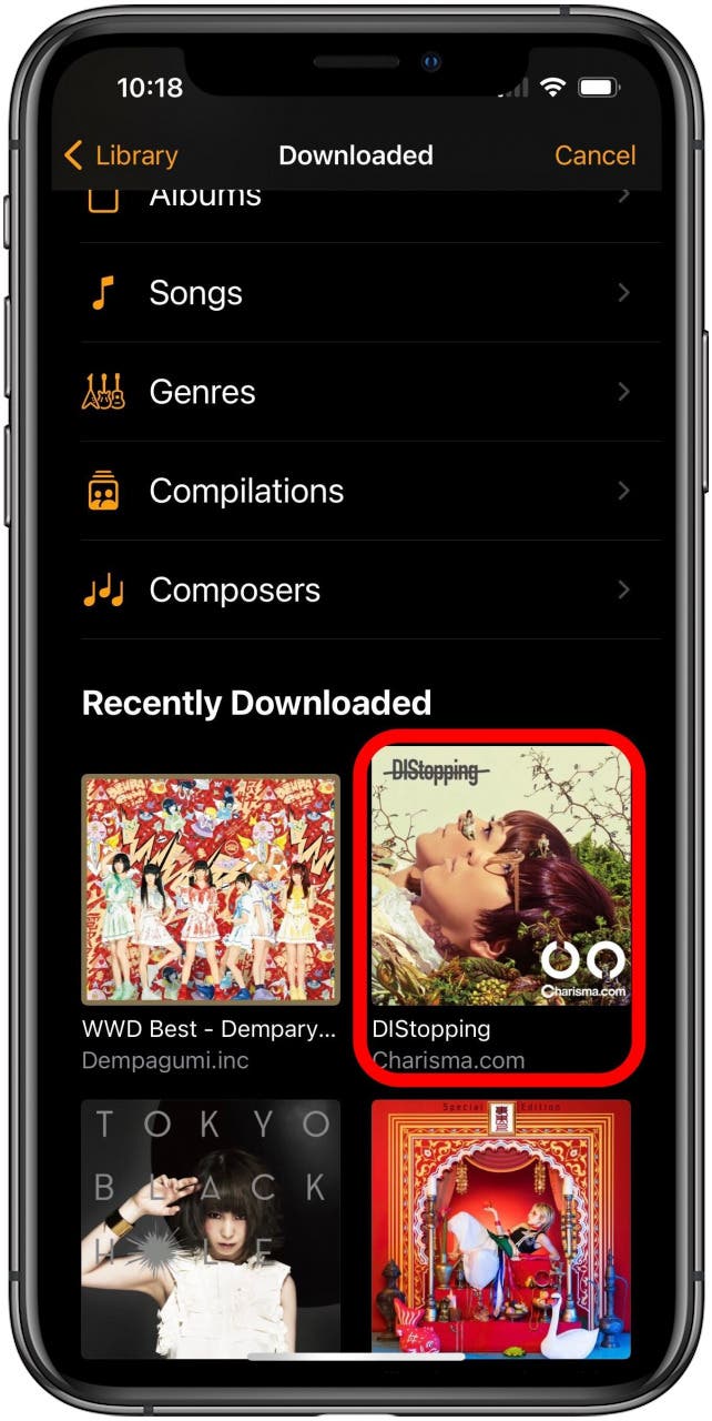 Clock app in Downloaded screen for Library with an album in the Recently Downloaded section marked.