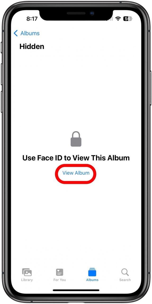 The Photos app with the unlock screen for the Hidden album showing and the View Album option marked.