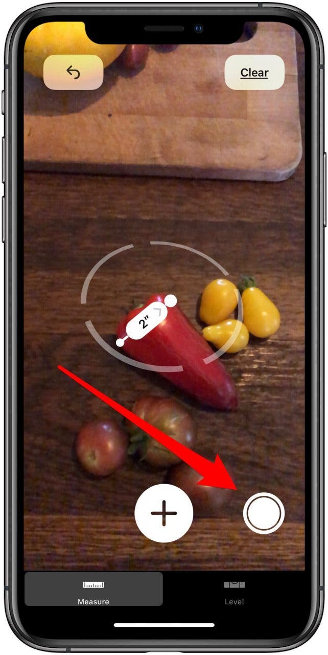 нажмите кнопку спуска затвора, чтобы сделать снимок измерения приложения измерения
