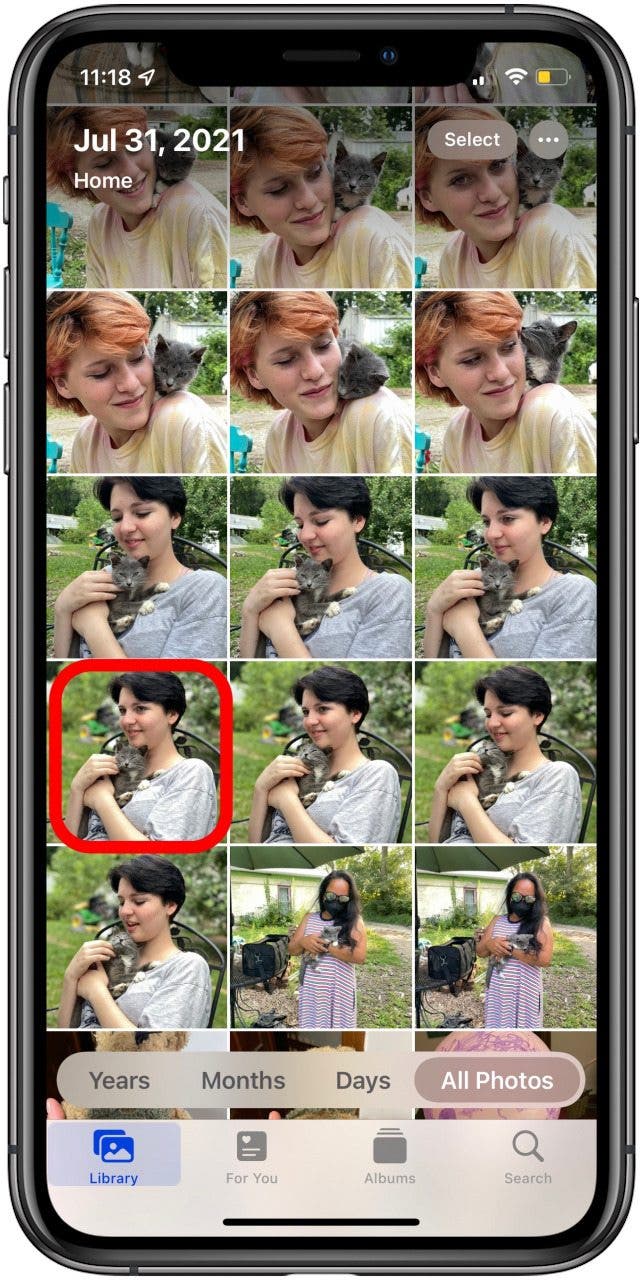 tap the library tab then tap the photo of the person you want to add to the people album