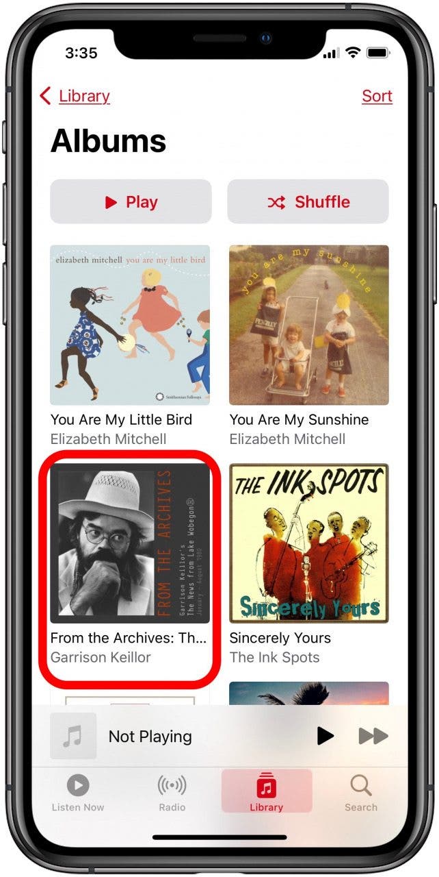 touch and hold an album or playlist for songs download