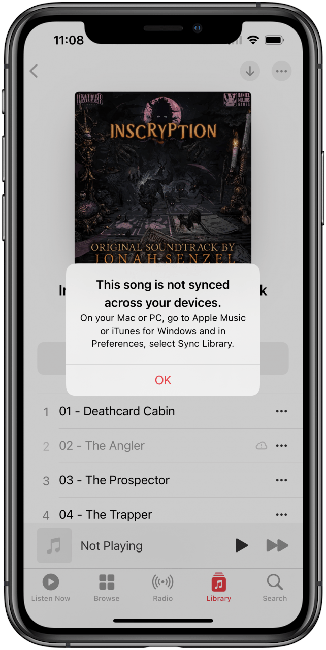 Music app with cloud error message open.