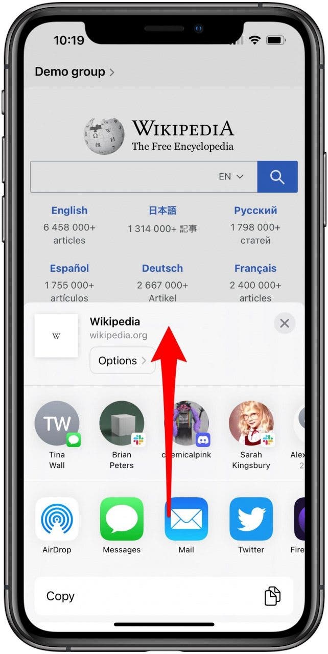 Safari app with the Share Sheet for a Group tab open and a marking indicating to swipe the sheet up.